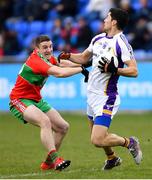 13 April 2019; Rory O'Carroll of Kilmacud Crokes is tackled by Davey Byrne of Ballymun Kickhams during the Dublin County Senior 1 Club Football Championship Round 1 match between Ballymun Kickhams and Kilmacud Crokes at Parnell Park in Dublin. Photo by Ramsey Cardy/Sportsfile