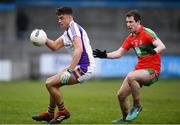 13 April 2019; Conor Casey of Kilmacud Crokes in action against Aaron Elliot of Ballymun Kickhams during the Dublin County Senior 1 Club Football Championship Round 1 match between Ballymun Kickhams and Kilmacud Crokes at Parnell Park in Dublin. Photo by Ramsey Cardy/Sportsfile