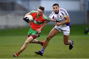 13 April 2019; Carl Keeley of Ballymun Kickhams in action against Craig Dias of Kilmacud Crokes during the Dublin County Senior 1 Club Football Championship Round 1 match between Ballymun Kickhams and Kilmacud Crokes at Parnell Park in Dublin. Photo by Ramsey Cardy/Sportsfile