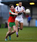 13 April 2019; Craig Dias of Kilmacud Crokes in action against Aaron Elliot of Ballymun Kickhams during the Dublin County Senior 1 Club Football Championship Round 1 match between Ballymun Kickhams and Kilmacud Crokes at Parnell Park in Dublin. Photo by Ramsey Cardy/Sportsfile