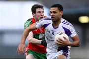 13 April 2019; Craig Dias of Kilmacud Crokes in action against Aaron Elliot of Ballymun Kickhams during the Dublin County Senior 1 Club Football Championship Round 1 match between Ballymun Kickhams and Kilmacud Crokes at Parnell Park in Dublin. Photo by Ramsey Cardy/Sportsfile