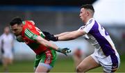 13 April 2019; Liam O'Donovan of Ballymun Kickhams in action against Nathan Nolan of Kilmacud Crokes during the Dublin County Senior 1 Club Football Championship Round 1 match between Ballymun Kickhams and Kilmacud Crokes at Parnell Park in Dublin. Photo by Ramsey Cardy/Sportsfile