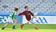 13 April 2019; Cian Lawlor from St Vincents GAA Club Co Longford in action against Ruairi Kirkwood from O'Raghallaighs Gaelic GAA Club Co Louth at the Littlewoods Ireland Go Games Provincial Days in Croke Park. This year over 6,000 boys and girls aged between six and twelve represented their clubs in a series of mini blitzes and just like their heroes got to play in Croke Park. Photo by Matt Browne/Sportsfile