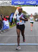 14 April 2019; Hiko Tonosa of Dundrum South Dublin AC, Co. Dublin, crosses the line to win the Great Ireland Run 2019 in conjunction with AAI National 10k Championships, ahead of Kevin Dooney of Raheny Shamrocks AC, Co. Dublin, at Phoenix Park in Dublin. Photo by Sam Barnes/Sportsfile