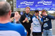 14 April 2019; Runners, from left, Erik Haaland, Nadim Ansary and Henrik Schiller celebrate with their medals following the Great Ireland Run 2019 in conjunction with AAI National 10k Championships at Phoenix Park in Dublin. Photo by Sam Barnes/Sportsfile