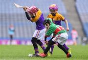 14 April 2019; Fionán Caulfield of Faythe Harriers, Co Wexford, left, in action against The Rower Inistioge, Co Kilkenny, during the Littlewoods Ireland Go Games Provincial Days in Croke Park. This year over 6,000 boys and girls aged between six and twelve represented their clubs in a series of mini blitzes and just like their heroes got to play in Croke Park. Photo by Piaras Ó Mídheach/Sportsfile