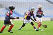 14 April 2019; Conal Ó Súilleabháin of Kilmacud Crokes, Co Dublin, centre, in action against Clontarf, Co Dublin, during the Littlewoods Ireland Go Games Provincial Days in Croke Park. This year over 6,000 boys and girls aged between six and twelve represented their clubs in a series of mini blitzes and just like their heroes got to play in Croke Park. Photo by Piaras Ó Mídheach/Sportsfile