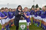 14 April 2019; Wexford WSSL team captain Fiona Ryan is presented with the cup by Frances Smith after the FAI Women’s U19 Interleague Cup Final match between Metropolitan GL and Wexford WSSL at Bridgewater Park, Co. Wicklow. Photo by Matt Browne/Sportsfile