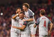 12 April 2019; John Aldridge of Liverpool FC Legends , centre, celebrates with from left, Patrick Berger, Steve McManaman and Jason McAteer during the Sean Cox Fundraiser match between the Republic of Ireland XI and Liverpool FC Legends at the Aviva Stadium in Dublin. Photo by Sam Barnes/Sportsfile