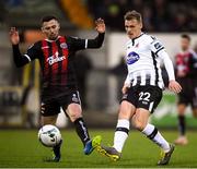 15 April 2019; Joe McKee of Dundalk in action against Robbie McCourt of Bohemians during the SSE Airtricity League Premier Division match between Dundalk and Bohemians at Oriel Park in Dundalk, Louth. Photo by Stephen McCarthy/Sportsfile
