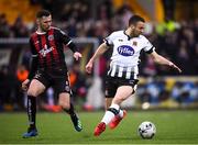 15 April 2019; Michael Duffy of Dundalk in action against Robbie McCourt of Bohemians during the SSE Airtricity League Premier Division match between Dundalk and Bohemians at Oriel Park in Dundalk, Louth. Photo by Stephen McCarthy/Sportsfile