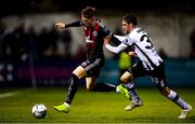 15 April 2019; Daniel Grant of Bohemians in action against Dean Jarvis of Dundalk during the SSE Airtricity League Premier Division match between Dundalk and Bohemians at Oriel Park in Dundalk, Louth. Photo by Stephen McCarthy/Sportsfile