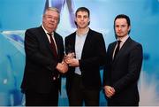 15 April 2019; Cian Kiely of UCC who was named in the Electric Ireland HE GAA Rising Star Football Team of the Year 2019 is presented with his award by John Dwane of Electric Ireland, left, and Michael Hyland, Chairman, Higher Education GAA. The Electric Ireland HE GAA Rising Star Awards was hosted by Electric Ireland Sigerson and Fitzgibbon winners UCC where the overall Footballer and Hurler of the Year were announced as well as the overall Football and Hurling team of the Year for the Electric Ireland Sigerson, Fitzgibbon and Higher Education Championships. #FirstClassRivals Photo by Diarmuid Greene/Sportsfile