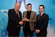 15 April 2019; Graham O'Sullivan of UCC who was named in the Electric Ireland HE GAA Rising Star Football Team of the Year 2019 is presented with his award by John Dwane of Electric Ireland, left, and Michael Hyland, Chairman, Higher Education GAA. The Electric Ireland HE GAA Rising Star Awards was hosted by Electric Ireland Sigerson and Fitzgibbon winners UCC where the overall Footballer and Hurler of the Year were announced as well as the overall Football and Hurling team of the Year for the Electric Ireland Sigerson, Fitzgibbon and Higher Education Championships. #FirstClassRivals Photo by Diarmuid Greene/Sportsfile