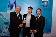 15 April 2019; Brian Ó Beaglaoích of UCC who was named in the Electric Ireland HE GAA Rising Star Football Team of the Year 2019 is presented with his award by John Dwane of Electric Ireland, left, and Michael Hyland, Chairman, Higher Education GAA. The Electric Ireland HE GAA Rising Star Awards was hosted by Electric Ireland Sigerson and Fitzgibbon winners UCC where the overall Footballer and Hurler of the Year were announced as well as the overall Football and Hurling team of the Year for the Electric Ireland Sigerson, Fitzgibbon and Higher Education Championships. #FirstClassRivals Photo by Diarmuid Greene/Sportsfile
