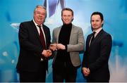 15 April 2019; Eddie Gunning of UCC who was named in the Electric Ireland HE GAA Rising Star Hurling Team of the Year 2019 is presented with his award by John Dwane of Electric Ireland, left, and Michael Hyland, Chairman, Higher Education GAA. The Electric Ireland HE GAA Rising Star Awards was hosted by Electric Ireland Sigerson and Fitzgibbon winners UCC where the overall Footballer and Hurler of the Year were announced as well as the overall Football and Hurling team of the Year for the Electric Ireland Sigerson, Fitzgibbon and Higher Education Championships. #FirstClassRivals Photo by Diarmuid Greene/Sportsfile