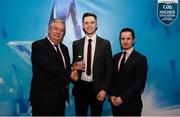 15 April 2019; Mark Reid of St Mary's University Belfast who was named in the Electric Ireland HE GAA Rising Star Football Team of the Year 2019 is presented with his award by John Dwane of Electric Ireland, left, and Michael Hyland, Chairman, Higher Education GAA. The Electric Ireland HE GAA Rising Star Awards was hosted by Electric Ireland Sigerson and Fitzgibbon winners UCC where the overall Footballer and Hurler of the Year were announced as well as the overall Football and Hurling team of the Year for the Electric Ireland Sigerson, Fitzgibbon and Higher Education Championships. #FirstClassRivals Photo by Diarmuid Greene/Sportsfile