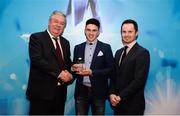15 April 2019; Evan Niland of NUIG who was named in the Electric Ireland HE GAA Rising Star Hurling Team of the Year 2019 is presented with his award by John Dwane of Electric Ireland, left, and Michael Hyland, Chairman, Higher Education GAA. The Electric Ireland HE GAA Rising Star Awards was hosted by Electric Ireland Sigerson and Fitzgibbon winners UCC where the overall Footballer and Hurler of the Year were announced as well as the overall Football and Hurling team of the Year for the Electric Ireland Sigerson, Fitzgibbon and Higher Education Championships. #FirstClassRivals Photo by Diarmuid Greene/Sportsfile