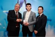 15 April 2019; James Bergin of DCU who was named in the Electric Ireland HE GAA Rising Star Hurling Team of the Year 2019 is presented with his award by John Dwane of Electric Ireland, left, and Michael Hyland, Chairman, Higher Education GAA. The Electric Ireland HE GAA Rising Star Awards was hosted by Electric Ireland Sigerson and Fitzgibbon winners UCC where the overall Footballer and Hurler of the Year were announced as well as the overall Football and Hurling team of the Year for the Electric Ireland Sigerson, Fitzgibbon and Higher Education Championships. #FirstClassRivals Photo by Diarmuid Greene/Sportsfile