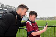 16 April 2019; Johnny Smacks poses for a selfie with a young player at the Littlewoods Ireland Go Games Provincial Days in Croke Park. This year over 6,000 boys and girls aged between six and twelve represented their clubs in a series of mini blitzes and – just like their heroes – got to play in Croke Park, Dublin.  Photo by Eóin Noonan/Sportsfile