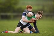 17 April 2019; Sean Wall of Midlands is tackled by Lachlann Kelleher of North Midlands during the U16 Bank of Ireland Leinster Rugby Shane Horgan Cup - Final Round match between North Midlands and Midlands at Cill Dara RFC in Dunmurray West, Kildare. Photo by Eóin Noonan/Sportsfile