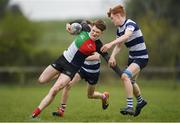 17 April 2019; Sean Wall of Midlands is tackled by Lachlann Kelleher of North Midlands during the U16 Bank of Ireland Leinster Rugby Shane Horgan Cup - Final Round match between North Midlands and Midlands at Cill Dara RFC in Dunmurray West, Kildare. Photo by Eóin Noonan/Sportsfile