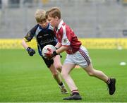 17 April 2019; Cillian Hussey of Tuslk GAA, Co. Roscommon, in action against Donnacha Henry of Tubbercurry/Cloonacool GAA, Co. Sligo during the Littlewoods Ireland Go Games Provincial Days in Croke Park. This year over 6,000 boys and girls aged between six and twelve represented their clubs in a series of mini blitzes and – just like their heroes – got to play in Croke Park, Dublin. Photo by Seb Daly/Sportsfile