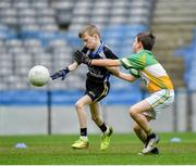 17 April 2019; Action from the game between Tubbercurry/Cloonacool GAA, Co. Sligo, and Oran GAA, Co. Roscommon, during the Littlewoods Ireland Go Games Provincial Days in Croke Park. This year over 6,000 boys and girls aged between six and twelve represented their clubs in a series of mini blitzes and – just like their heroes – got to play in Croke Park, Dublin. Photo by Seb Daly/Sportsfile