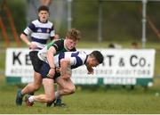 17 April 2019; Alex Robinson of North Midlands is tackled by Conor Gibney of Midlands during the U18 Bank of Ireland Leinster Rugby Shane Horgan Cup - Final Round match between North Midlands and Midlands at Cill Dara RFC in Dunmurray West, Kildare. Photo by Eóin Noonan/Sportsfile