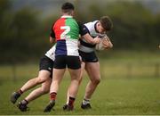 17 April 2019; Oisin Michael of North Midlands is tackled by Oran O'Reilly, hidden, and Dylan Farrell of Midlands during the U18 Bank of Ireland Leinster Rugby Shane Horgan Cup - Final Round match between North Midlands and Midlands at Cill Dara RFC in Dunmurray West, Kildare. Photo by Eóin Noonan/Sportsfile