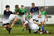 17 April 2019; Ben McGuinness of South East is tackled by Bao Tran, left, and Tadgh McKeever of Metropolitan during the U18 Bank of Ireland Leinster Rugby Shane Horgan Cup - Final Round match between South East and Metropolitan at IT Carlow in Moanacurragh, Carlow. Photo by Harry Murphy/Sportsfile