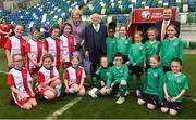 19 April 2019; The President of Ireland Michael D Higgins and his wife Sabina with the President of Irish Football Association David Martin, right, and players from Cliftonville FC and Linfield FC girls under 9 teams during his visit to the Irish Football Association Headquarters at the National Football Stadium in Windsor Park, Belfast. Photo by Oliver McVeigh/Sportsfile