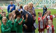 19 April 2019; The President of Ireland Michael D Higgins and his wife Sabina with players from Cliftonville FC and Linfield FC girls under 9 teams during his visit to the Irish Football Association Headquarters at the National Football Stadium in Windsor Park, Belfast. Photo by Oliver McVeigh/Sportsfile