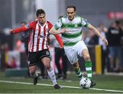19 April 2019; Joey O'Brien of Shamrock Rovers in action against Eoghan Stokes of Derry City during the SSE Airtricity League Premier Division match between Derry City and Shamrock Rovers at the Ryan McBride Brandywell Stadium in Derry. Photo by Stephen McCarthy/Sportsfile