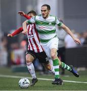19 April 2019; Joey O'Brien of Shamrock Rovers in action against Eoghan Stokes of Derry City during the SSE Airtricity League Premier Division match between Derry City and Shamrock Rovers at the Ryan McBride Brandywell Stadium in Derry. Photo by Stephen McCarthy/Sportsfile