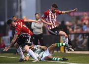 19 April 2019; David Parkhouse, left, and Patrick McClean of Derry City in action against Roberto Lopes of Shamrock Rovers during the SSE Airtricity League Premier Division match between Derry City and Shamrock Rovers at the Ryan McBride Brandywell Stadium in Derry. Photo by Stephen McCarthy/Sportsfile
