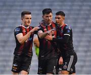19 April 2019; Dinny Corcoran of Bohemians, centre, is congratulated by team-mates Darragh Leahy, left, and Daniel Mandroiu after scoring his side's first goal during the SSE Airtricity League Premier Division match between Bohemians and UCD at Dalymount Park in Dublin. Photo by Seb Daly/Sportsfile