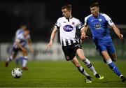 19 April 2019; Daniel Kelly of Dundalk in action against Sam Todd of Finn Harps during the SSE Airtricity League Premier Division match between Dundalk and Finn Harps at Oriel Park in Dundalk, Co. Louth. Photo by Ben McShane/Sportsfile