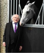 22 April 2019; President of Ireland Michael D. Higgins meets Whisper In The Breeze, a horse trained by Jessica Harrington, during the Fairyhouse Easter Festival - Irish Grand National day at Fairyhouse Racecourse in Ratoath, Meath. Photo by David Fitzgerald/Sportsfile