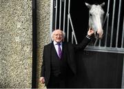 22 April 2019; President of Ireland Michael D. Higgins meets Whisper In The Breeze, a horse trained by Jessica Harrington, during the Fairyhouse Easter Festival - Irish Grand National day at Fairyhouse Racecourse in Ratoath, Meath. Photo by David Fitzgerald/Sportsfile