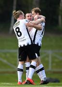 22 April 2019; Georgie Kelly of Dundalk, right, celebrates after scoring his side's third goal with team-mates John Mountney and Michael Duffy during the SSE Airtricity League Premier Division match between UCD and Dundalk at the UCD Bowl, Belfield in Dublin. Photo by Harry Murphy/Sportsfile