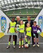 24 April 2019; Republic of Ireland mens national team manager Mick McCarthy, and Republic of Ireland Womens national team manager Colin Bell were on hand at the Aviva Stadium today to launch the 2019 SportsDirect.com FAI Summer Soccer Schools programme. The SportsDirect.com Summer Soccer Schools programme is the FAI’s largest grass roots programme and one of the most important as it encourages children’s involvement in sport, in a fun and friendly environment. Camps begin on July 1st and run right through to August 23rd, and are priced at €70. Pictured at the launch are, from left, Murphy Alade, age 11, from Irishtown, Dublin, Republic of Ireland mens national team manager Mick McCarthy, sisters Nicole Carberry, age 10, and Sarah Carberry, age 7, from Athlone, Co. Roscommon, Republic of Ireland womens national team manager Colin Bell, and Jamie Stafford Doyle, age 10, from Rosslare, Co. Wexford, at the Aviva Stadium in Dublin. Photo by Seb Daly/Sportsfile