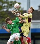 25 April 2019; Eric Green of Wales in action against Jack Doherty, left, and Ross Tierney of Republic of Ireland during the SAFIB Centenary Shield Under 18 Boys’ International match between Republic of Ireland and Wales at Home Farm FC in Whitehall, Dublin. Photo by Matt Browne/Sportsfile