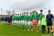 25 April 2019; The Republic of Ireland squad stand for the national anthem before the SAFIB Centenary Shield Under 18 Boys’ International match between Republic of Ireland and Wales at Home Farm FC in Whitehall, Dublin. Photo by Matt Browne/Sportsfile