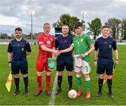 25 April 2019; Referee Mark Houilan with Wales captain Lee Jenkins and Republic of Ireland captain Josh Honohan before the SAFIB Centenary Shield Under 18 Boys’ International match between Republic of Ireland and Wales at Home Farm FC in Whitehall, Dublin. Photo by Matt Browne/Sportsfile
