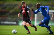 26 April 2019; Conor Levingston of Bohemians in action against Ismahil Akinade of Waterford during the SSE Airtricity League Premier Division match between Bohemians and Waterford at Dalymount Park in Dublin. Photo by Sam Barnes/Sportsfile