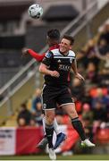 26 April 2019; Dan Casey of Cork City in action against Junior Ogedi-Uzokwe of Derry City during the SSE Airtricity League Premier Division match between Derry City and Cork City at the Ryan McBride Brandywell Stadium in Derry. Photo by Oliver McVeigh/Sportsfile