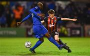 26 April 2019; Paddy Kirk of Bohemians in action against Ismahil Akinade of Waterford during the SSE Airtricity League Premier Division match between Bohemians and Waterford at Dalymount Park in Dublin. Photo by Sam Barnes/Sportsfile
