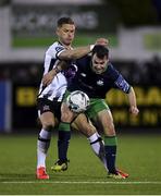26 April 2019; Joel Coustrain of Shamrock Rovers in action against Dane Massey of Dundalk during the SSE Airtricity League Premier Division match between Dundalk and Shamrock Rovers at Oriel Park in Dundalk, Louth. Photo by Seb Daly/Sportsfile