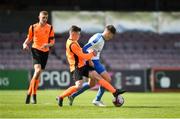 27 April 2019; Kevin O'Donoghue, Blarney United, in action, against Jack Halligan, left, St. Kevin's Boys, during the FAI Under-17 Cup Final match between St Kevin’s Boys and Blarney United at Dalymount Park in Dublin. Photo by Barry Cregg/Sportsfile